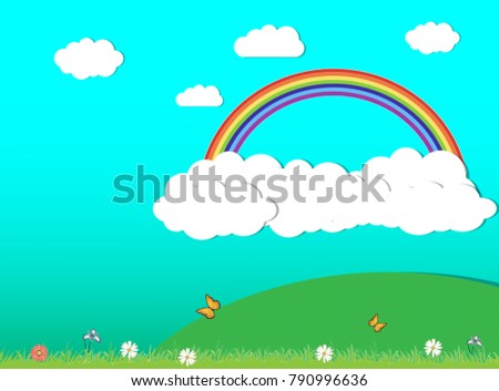 rainbow with green meadow and blue sky