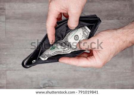 A studio photo of a mans wallet