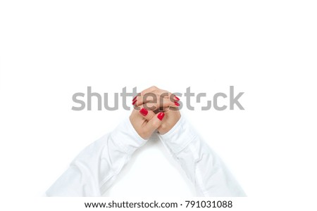 Woman's  hands in white shirt on white background