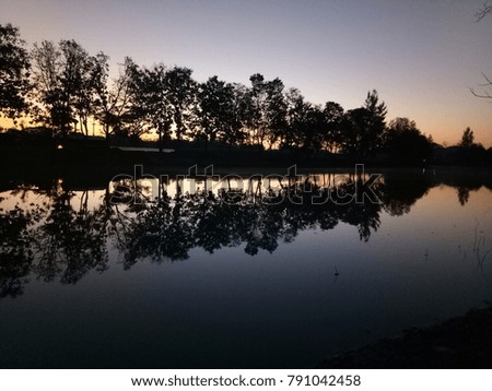 nature on silhouette background and reflection picture in the river view