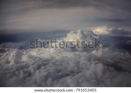 Clouds seen from above in a blanket tight cover