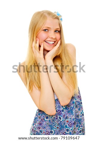 Surprised happy blonde girl wearing sundress holding hands near face over isolated background