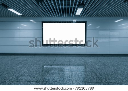 Blank billboard in metro station