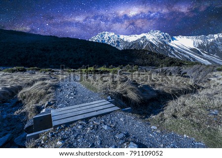 Track to the Mount Cook National Park with milkyway background
