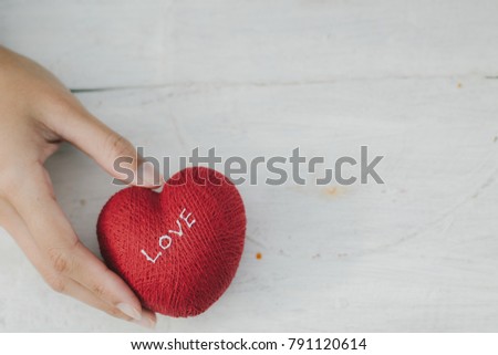 Love hearts on wooden texture background, valentines day card concept -vintage style picture and vintage color