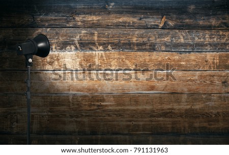 spot light on wooden wall