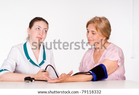 portrait of a good doctors working on white
