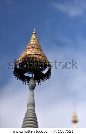 A golden golden pagoda at Sathira Dhammasathan, Bangkok, Thailand.