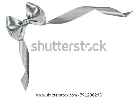silver present gift silk ribbon bow with ribbon by corner frame  on white background