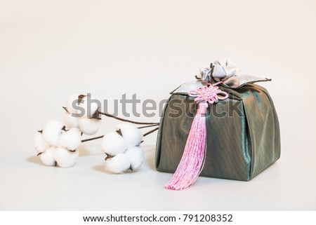 Korean traditional wrapping cloth and Cotton flower Royalty-Free Stock Photo #791208352