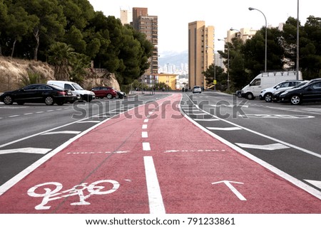 red bike road in the middle of the road