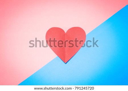 Heart on pink and blue background