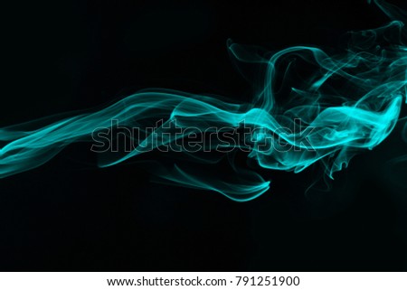 Blue smoke abstract on black background, darkness concept Royalty-Free Stock Photo #791251900