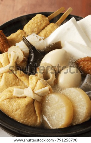 Japanese oden. vegetables, fish dumplings and various other articles of food stewed in a thin soy soup.