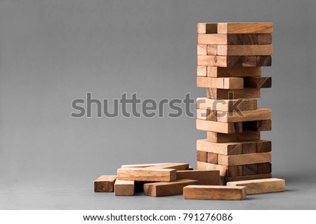 block wooden game on gray background Royalty-Free Stock Photo #791276086