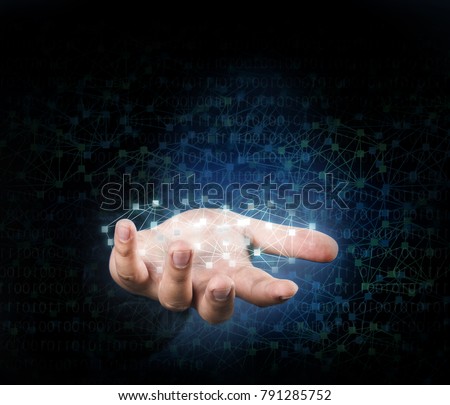 hand show gold intangible graphic in network link symbol in dark background Royalty-Free Stock Photo #791285752