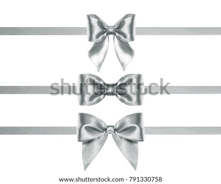 silver present satin ribbon bows with horizontal ribbons  isolated on white background. holiday background. gift card concept