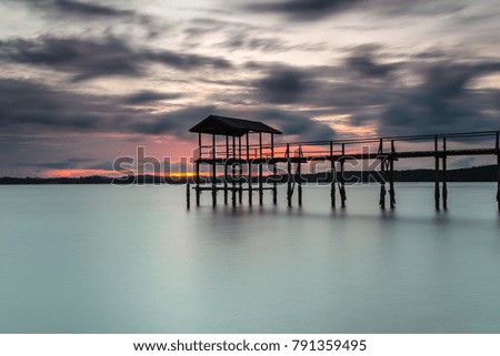 Beautiful long exposure picture of  sunset over the jetty. 