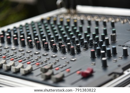 Music mixer equalizer console for mixer control sound device. Sound technician audio mixer equalizer control.Sound Mastering For Radio and TV Broadcast.