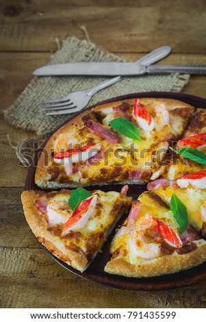 pizza on wooden table