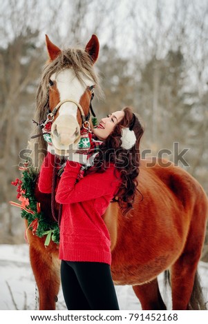 girl with horse at Christmas