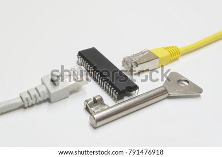 Two network connection plugs divided by a microchip and a key on white background