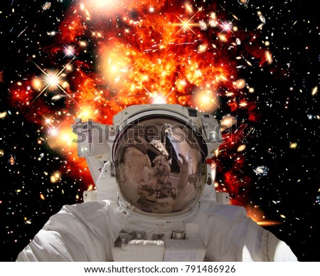 Astronaut and deep space. Science theme. Selfie photo. The elements of this image furnished by NASA.