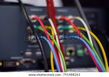 Cable with various colors connected to the mixer