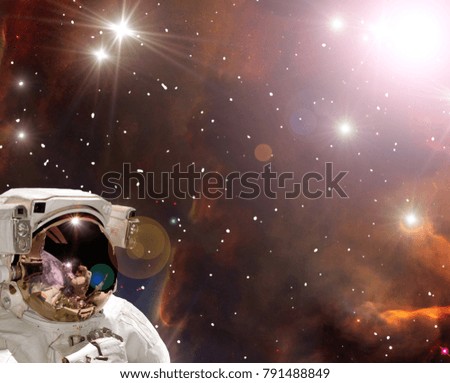 Astronaut surfing space with stars. Science scene. The elements of this image furnished by NASA.
