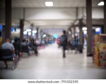 out of focus bus station terminal on an early morning blur architecture and traveling people low lighting low contrast background for relax and lonesome journey background picture theme