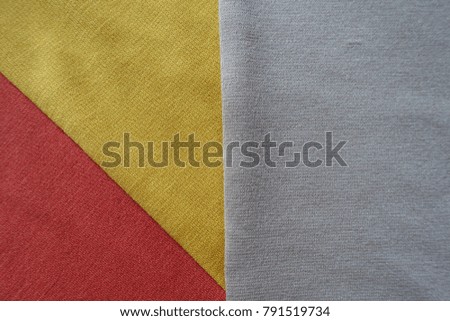 Orange, yellow and beige fabrics sewn together