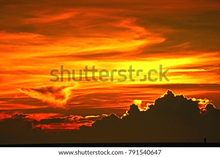 scenic cloudscape when sunset behind cloudy over sea horizon so beauty and colorful pattern for background