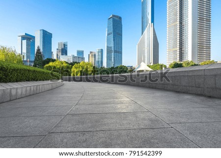 Panoramic skyline and buildings with empty square floor in shanghai china