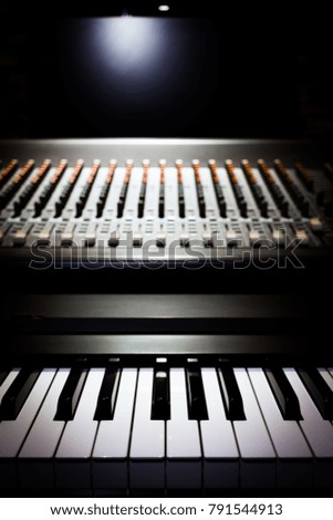 piano and sound mixer in recording studio, music background