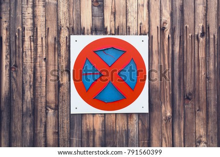 Parking not allowed on wooden wall