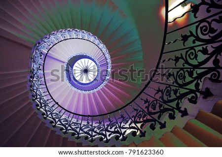Artistic image of spiral staircase, the Tulip Stairs in Greenwich London, with psychedelic colours and photoshop effects