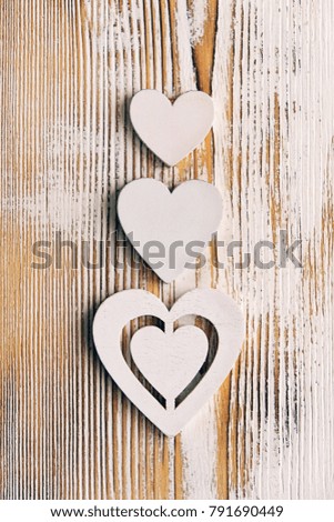 white hearts on rustic wooden background. beautiful still life, concept of Valentine's day. heart, symbol of love. heart decor, design for Valentine's day greetings card. copy space
