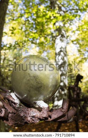 a picture of a creature of the woods and his orb