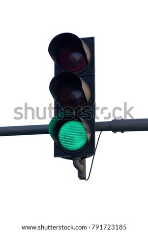 Isolated green traffic light over a white background.