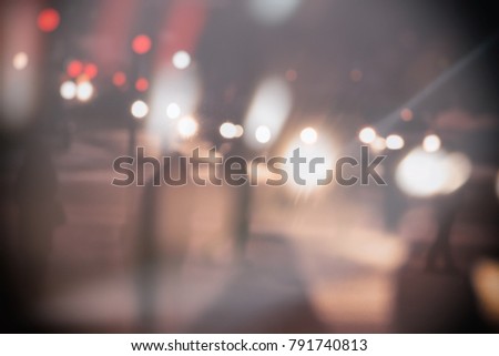 Multicolored defocused lights in the city at night