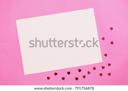 Paper pink background with empty notes and hearts. The concept of Valentine Day. Flat Lay, top view