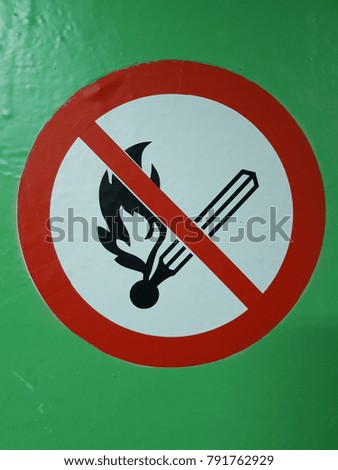The prohibiting sign . prohibited from using open fire.