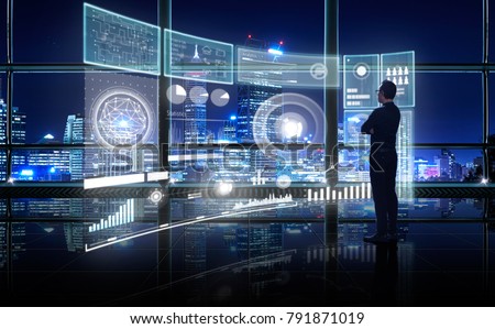 Smart financial analytics working at modern office with big data ,connections icon, internet of things, financial charts and graph virtual screen.