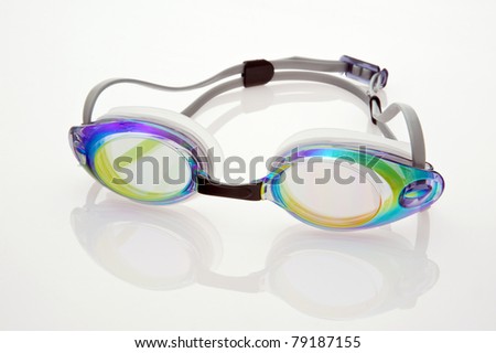 Swimming goggles isolated on white with reflection