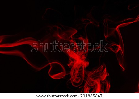 Red smoke abstract on black background, darkness concept