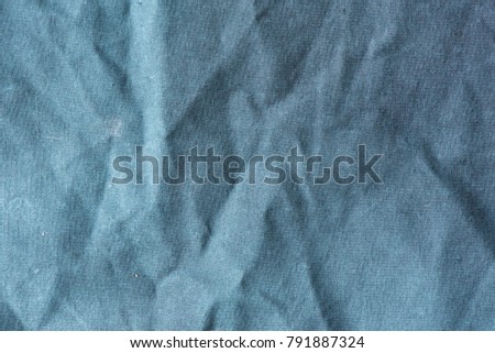 Canvas blue jeans texture. Clothes background