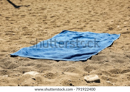 Towel background on beach and free space for your decoration. Summer time. 