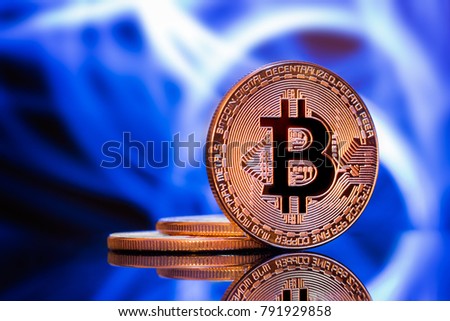 Bitcoin on a background of abstract blue lighting