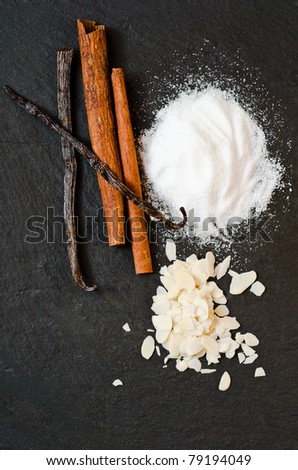ingredients for cakes on black natural stone