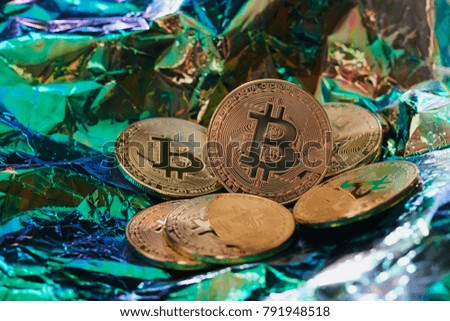 bitcoin on the digital images. Electronic background. gold.